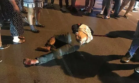 Hà Nội: Xế "điên" đâm xe máy, kéo lê nạn nhân vài trăm mét